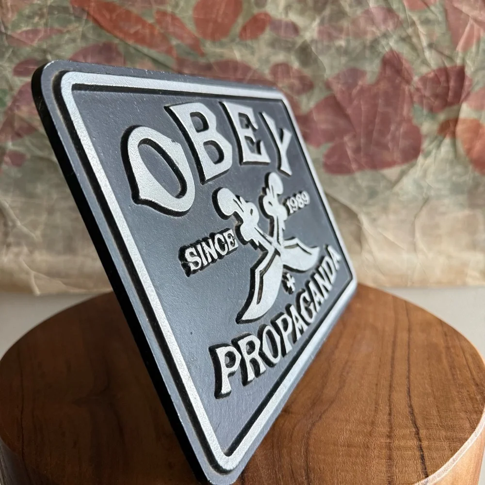 Obey Swords 2009 Shepard Fairey Die Cast Metal Sign Propaganda Plaque